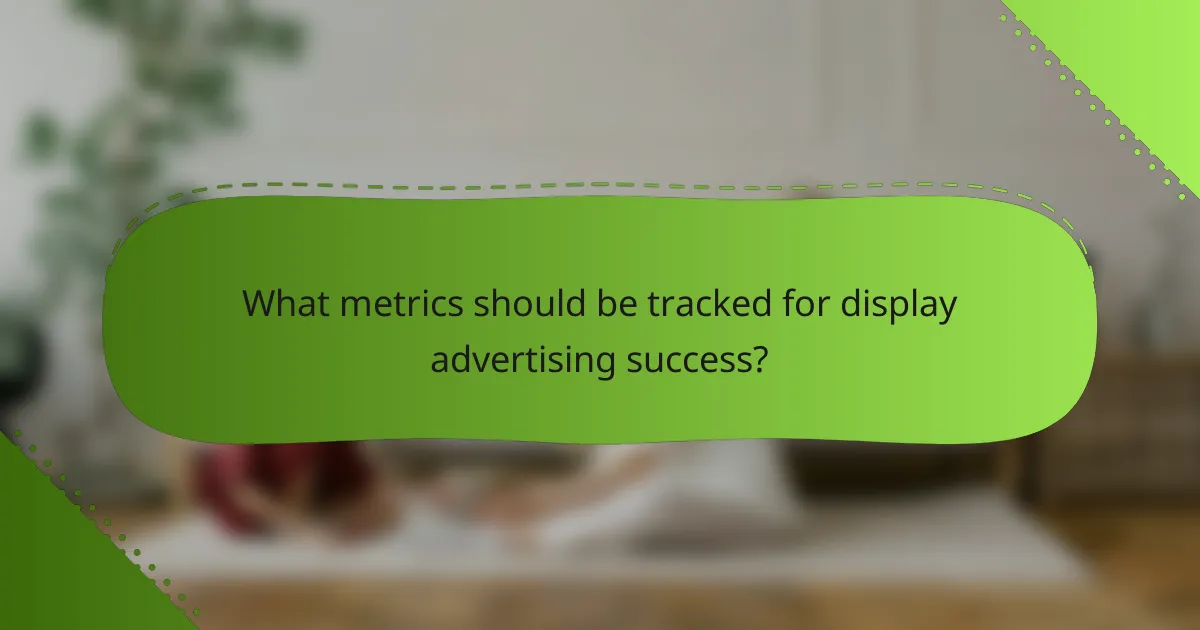 What metrics should be tracked for display advertising success?